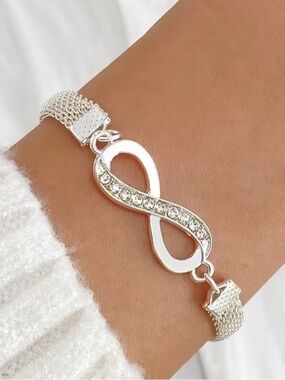 Sparkling Silver Infinity Bracelet with Crystal Accents